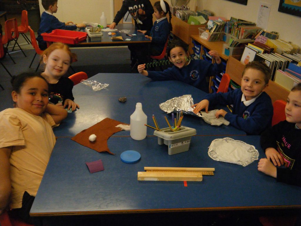 Year 1 pupils at craft table